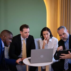 Group of white collar workers are working and meeting at office.